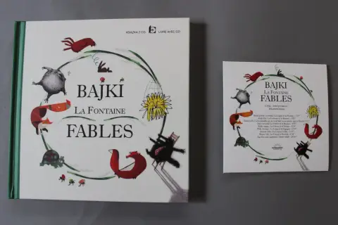 Książka z CD z bajkami La Fontaine, ilustrowana wesołymi zwierzętami. Idealna dla miłośników klasycznych opowieści.